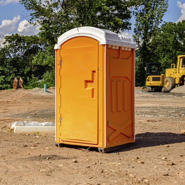 how often are the portable restrooms cleaned and serviced during a rental period in Roaring Brook